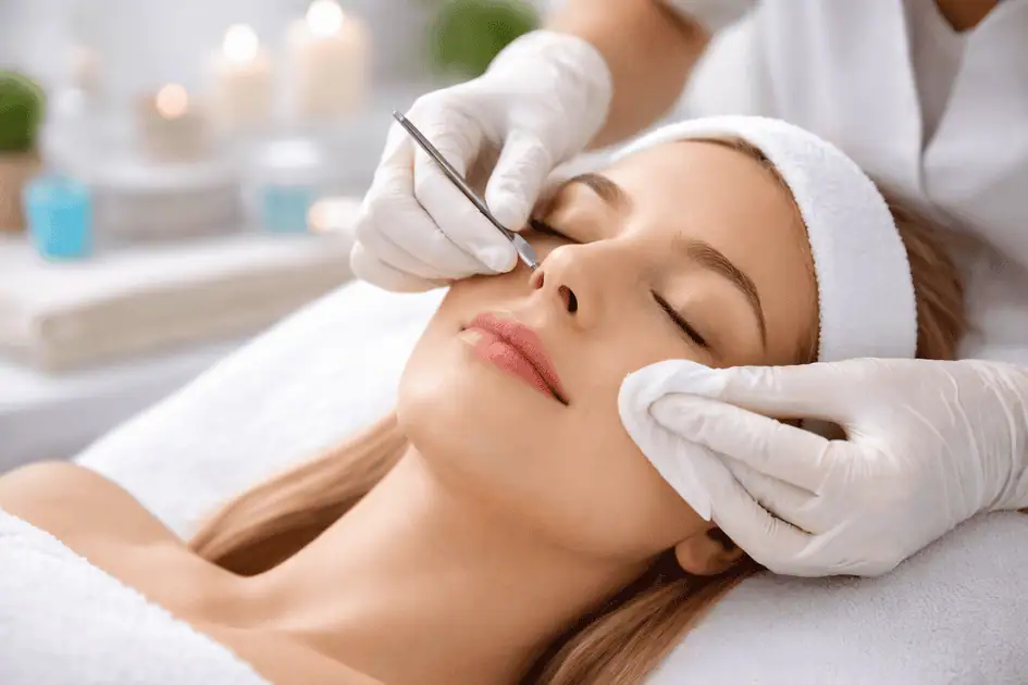 Woman enjoying a post-extraction facial glowing skin treatment